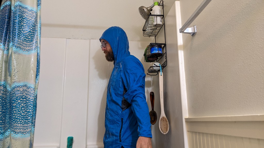 running jacket - testing out the water resistance of these jackets sometimes meant...