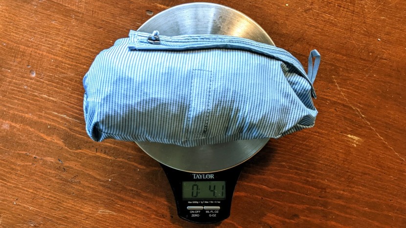 the patagonia houdini air packs into its own pocket and is...