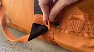 Easily snap the suitcase style handles out of the way when you don&#039;t...