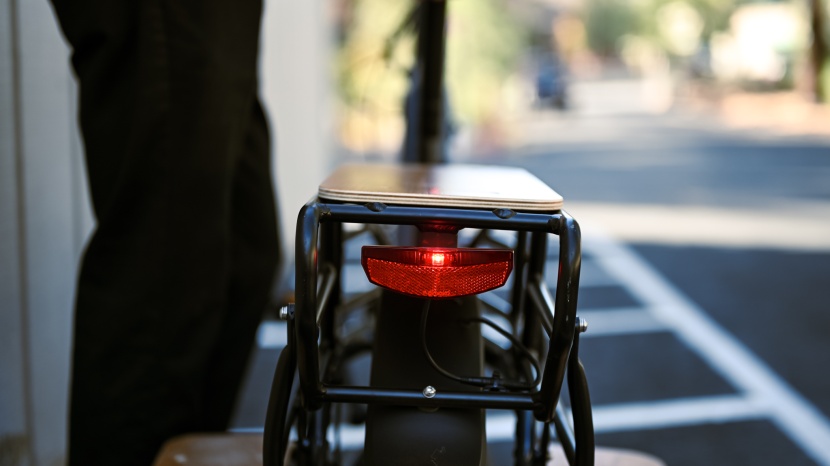 the rear lights blink as the brakes are applied.