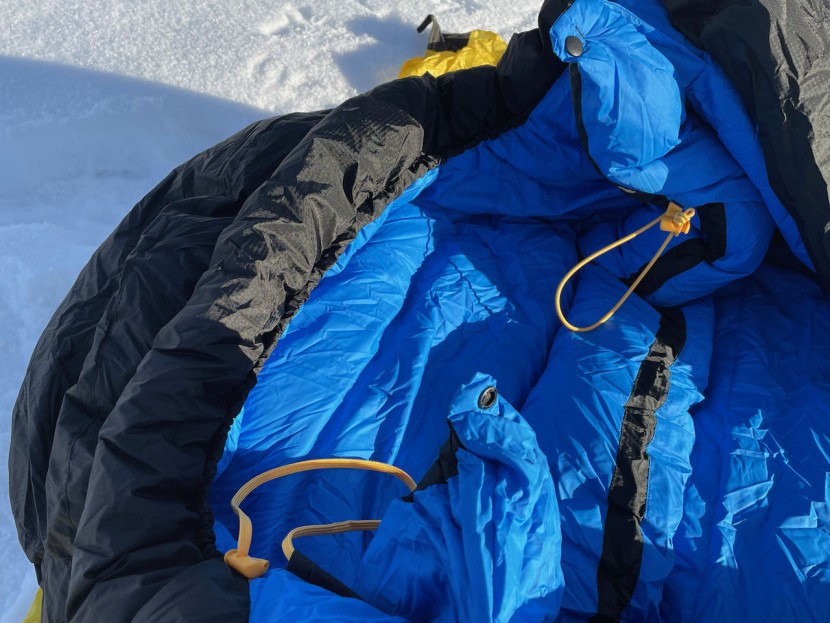 marmot col -20 - two cinch straps help keep cold air out, but the cords are in your...