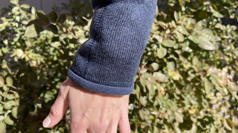 the better sweater's sleeves are fine for standing around but a lack...