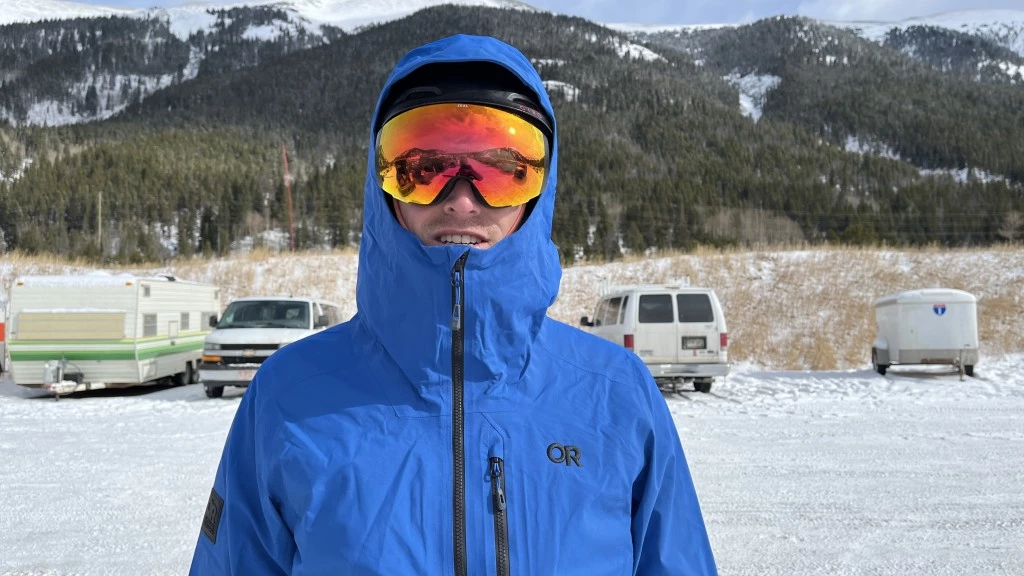 outdoor research hemispheres ii ski jacket men review - a large hood swallows a helmeted head, effectively sealing the...