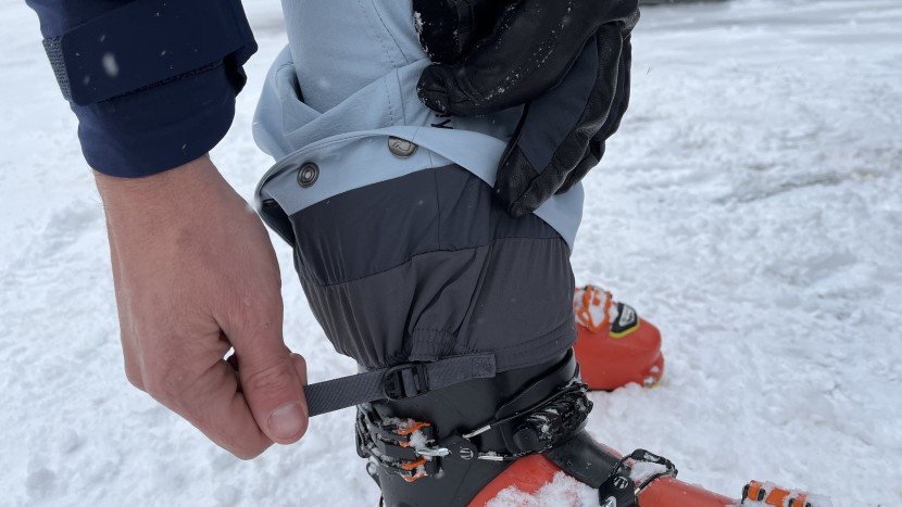 a cinch tab allows the user to tighten the elastic powder gaiter...