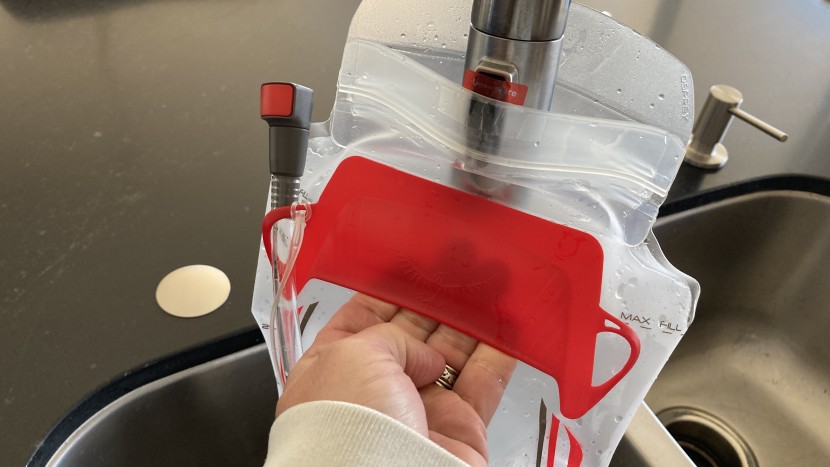 osprey syncro 12 - the integrated handle and wide mouth opening make filling this...