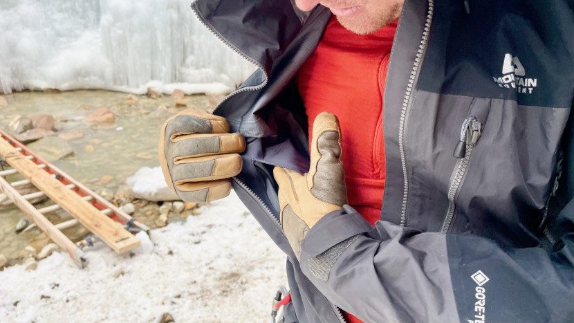 an internal zippered chest pocket is useful for holding a phone...