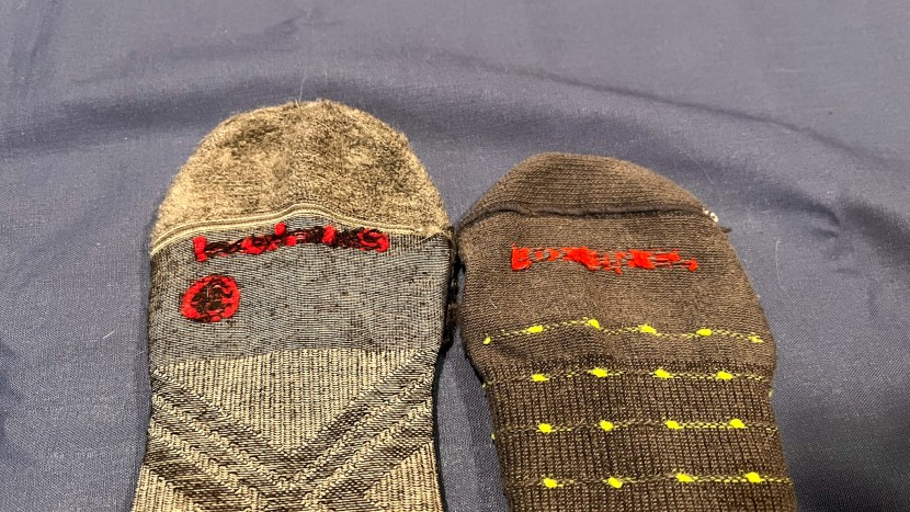 ski socks - comparing the toe seam between the smartwool (left) and the fox...