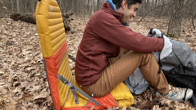 a unique, ground-sitting rocker that uses a sleeping pad for support...
