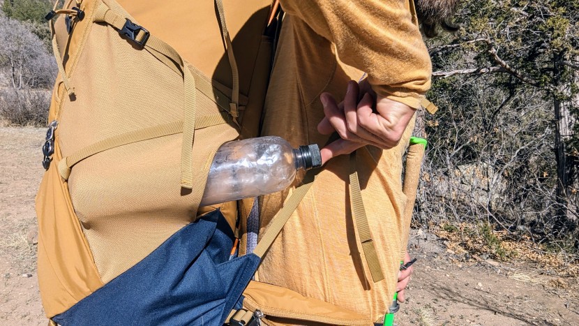 deuter aircontact core 65+10 - the right-side water bottle pocket has a forward-facing opening so...