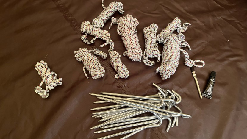 snow peak alpha breeze - so many stakes, so many guylines, and a repair glue kit too.