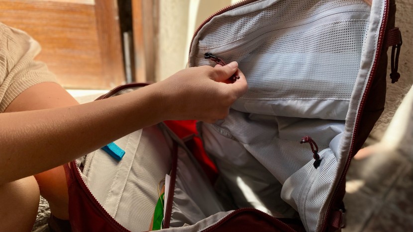 rei co-op ruckpack 40 - the found ourselves using this large mesh pocket for chargers and...