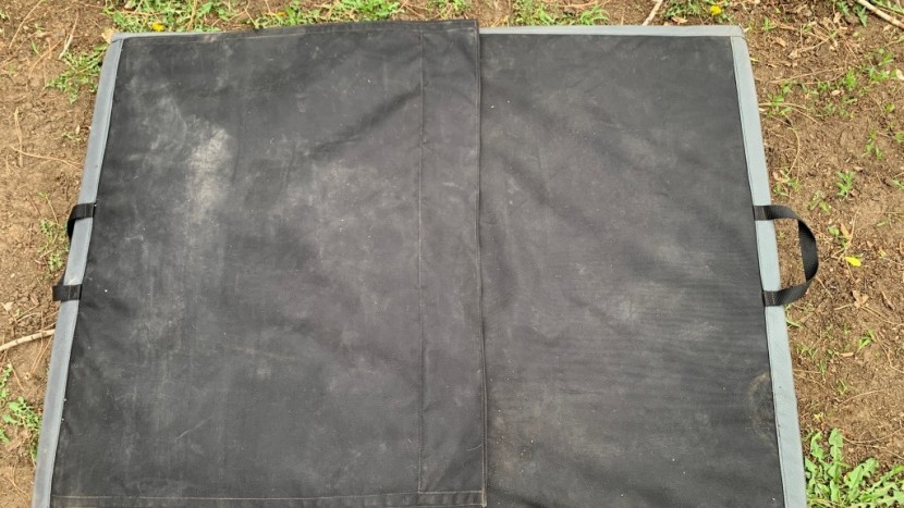 bouldering crash pad - the kinetik newton has a velcro flap that can entirely cover its...