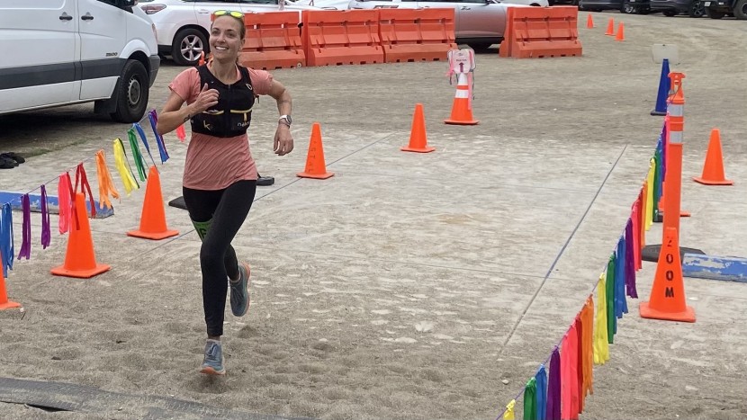 hydration pack for running womens - our main tester pushing across the finish line of a mountain race in...