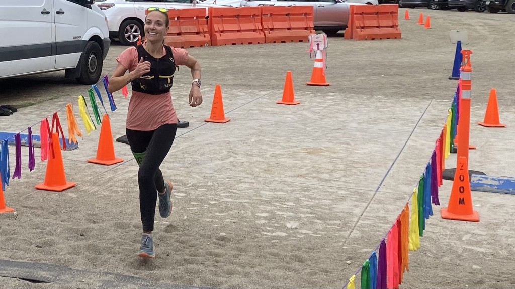 hydration pack for running womens - our main tester pushing across the finish line of a mountain race in...