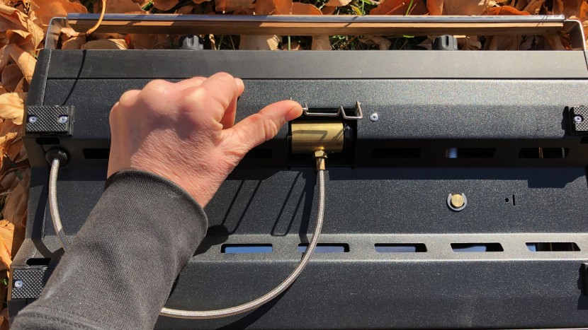 to remove the regulator, lift the spring-loaded housing to release...