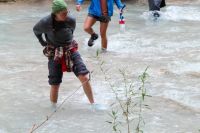 Testing water shoes often means wading through some very cold water.