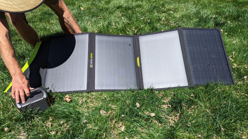 testing how the goal zero nomad's support arms function to angle the...