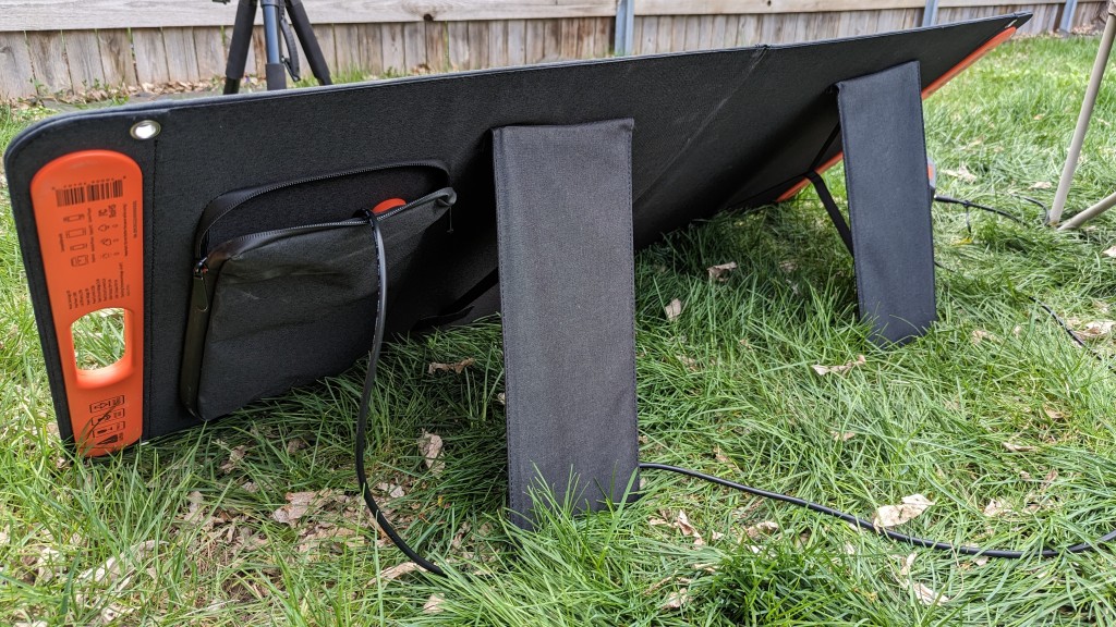 solar camping - the jackery solarsaga has collapsible legs to angle the panel in the...