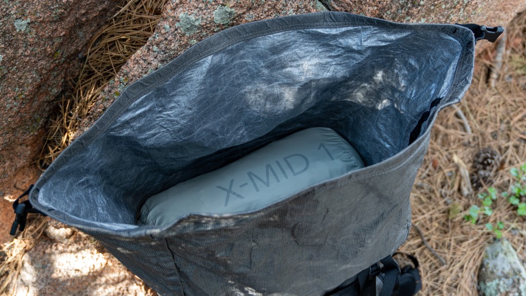 ultralight backpack - a wide top opening and stiffer fabric make it easy to place bulky...