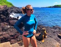 Testing rash guards while snorkeling with sea lions in the Galapagos.