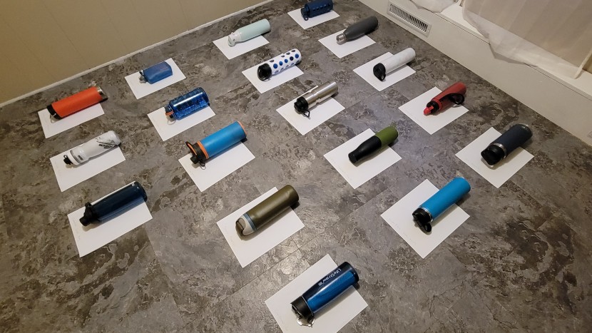 water bottle - for the leakproof test, water bottles were filled with blue-dyed...