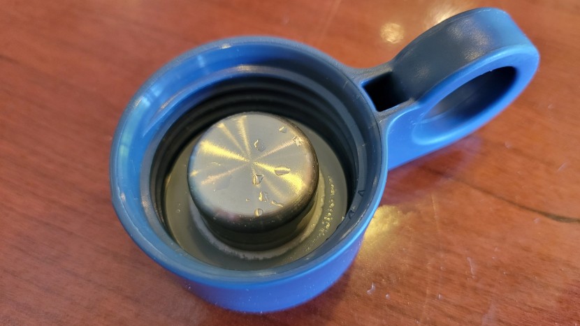 water bottle - the lid on the purifyou premium glass bottle has a stainless steel...