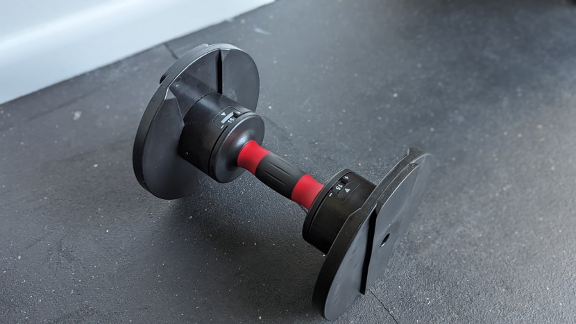 core home fitness adjustable set - round dumbbells can roll on an uneven floor and aren&#039;t stable if...