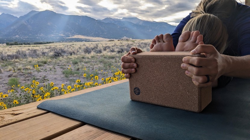 you often see the manduka cork block in yoga studios because it is...