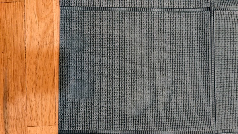 yoga mat - the footprint test showing a large amount of compression.