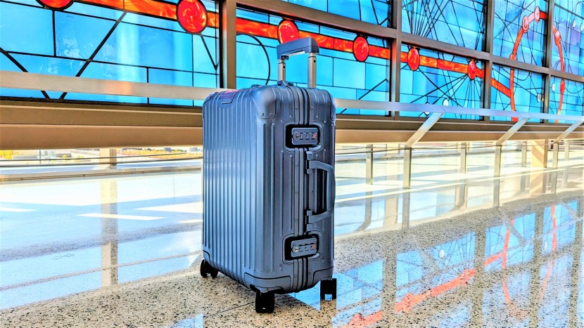 carry on luggage - it kinda acts like it owns the place. the rimowa is all-class, all...