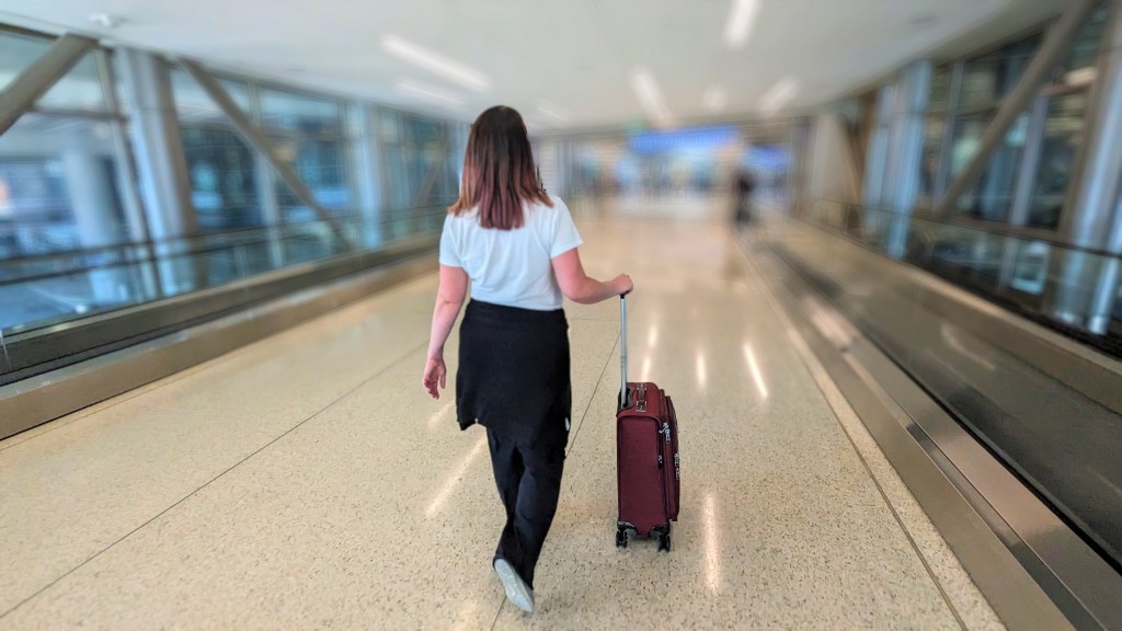 travelpro platinum elite 21&quot; expandable spinner - taxiing to our gate. the travelpro&#039;s magnetically aligning wheels...