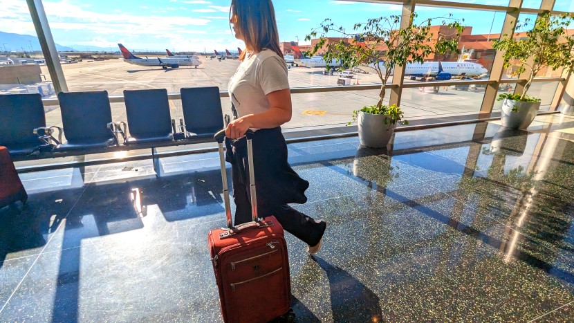 travelpro platinum elite 21&quot; expandable spinner - headed for home with our trusty friend keeping pace by our side.