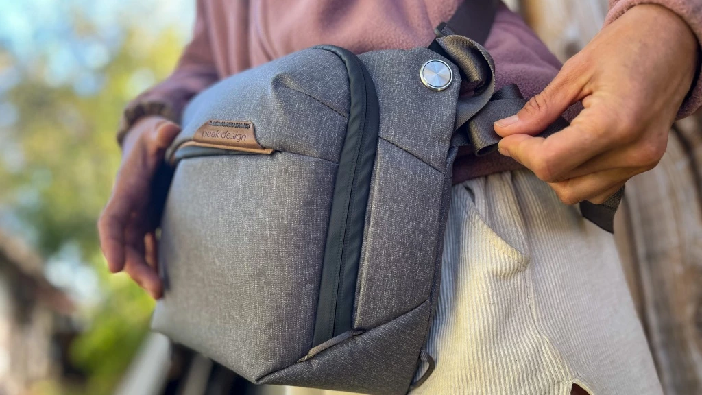 travel bag - the peak designs everyday has a slot that stores extra strap...
