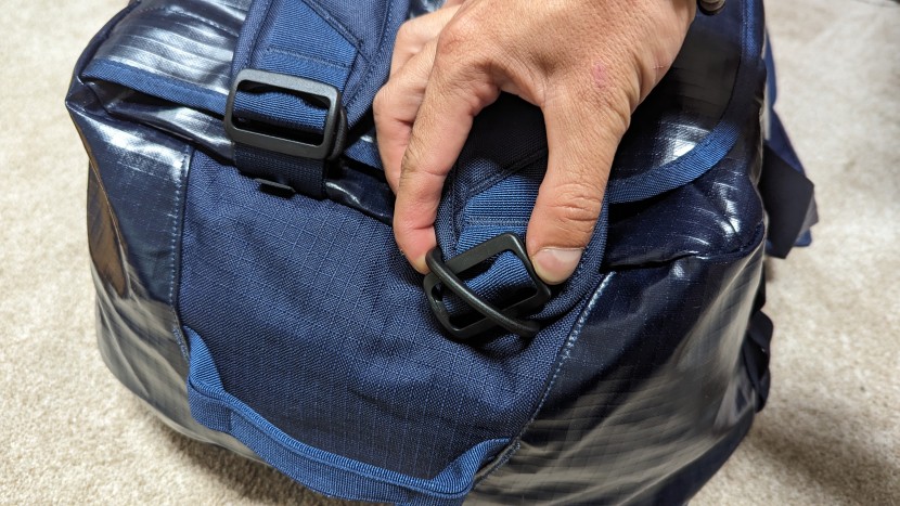 patagonia black hole duffel - buckles on both the top and bottom of the black hole&#039;s backpack...