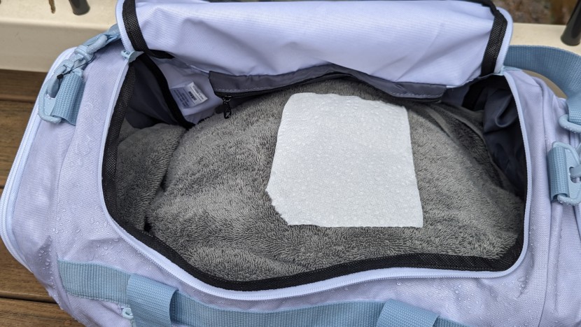 water rolled right off the fabric of the bag, and kept our...