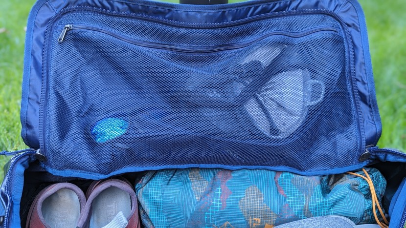 single zippered pocket on the hood of the 55l black hole.