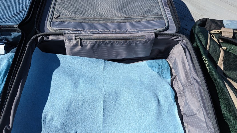 amazon basics 20-inch hardside spinner - the top corner of our moisture-detection system (paper towel) was...