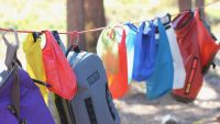 A whole bunch of bags hanging up to dry after a day of testing.