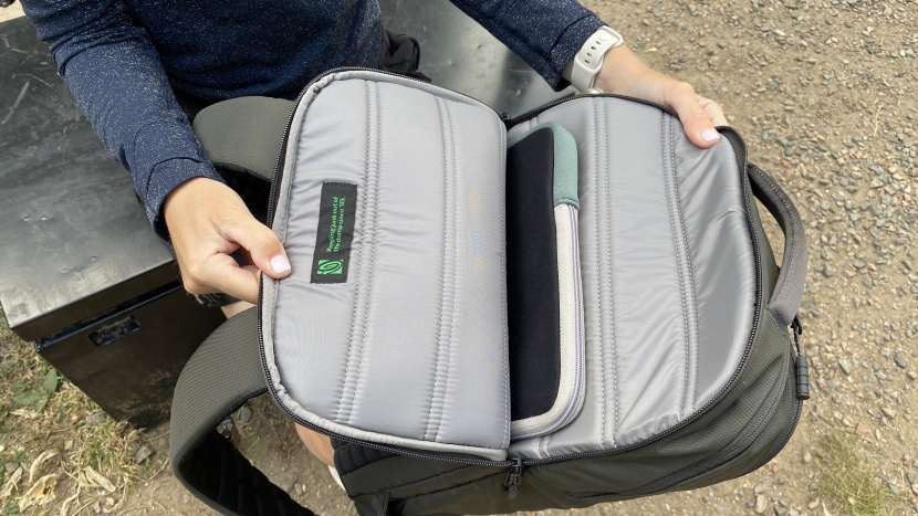 the dedicated laptop pocket is padded front and back with ample...