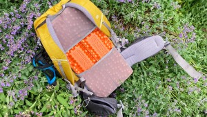 Replace the included back padding with your own closed-cell foam...