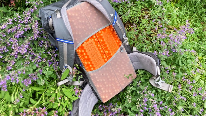 swap out the included back padding for your own sleeping mat to save...