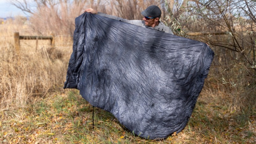 ultralight sleeping bag - like many quilts, this one can open up into a full blanket for warm...