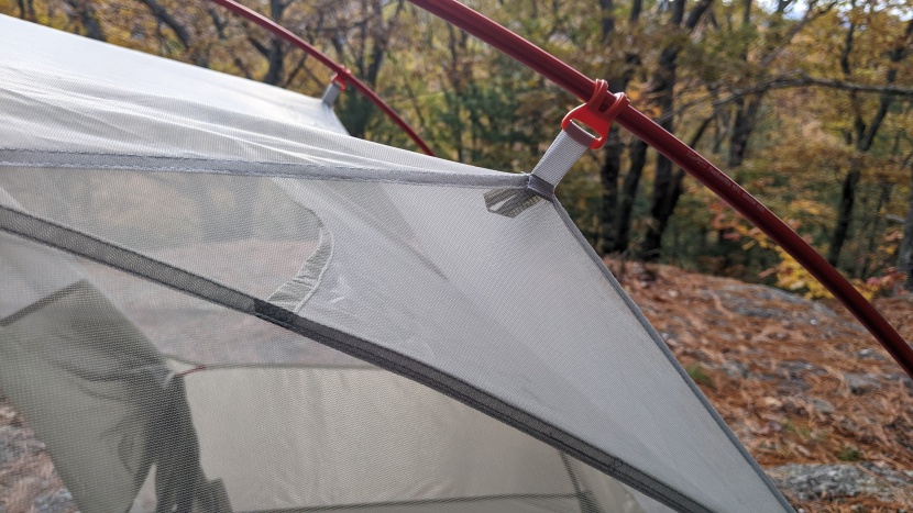 once you get the poles into the corners, simply clip the tent to them.