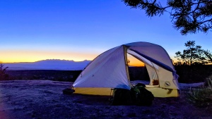 When camping on slick rock, semi-freestanding tents require you to...