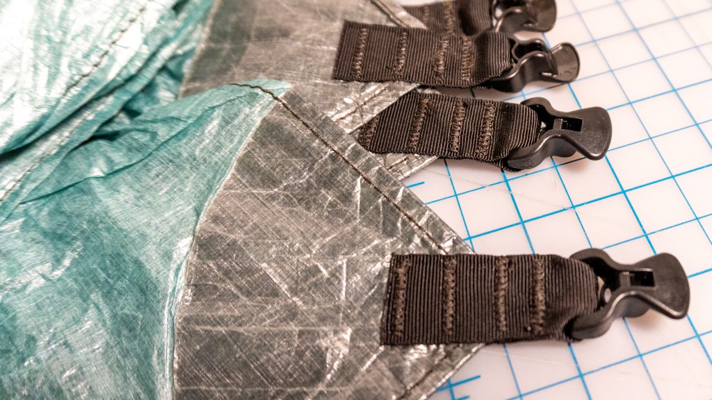 hyperlite mountain gear flat tarp - sixteen total line locks are sewn into the tarp, with reinforced...