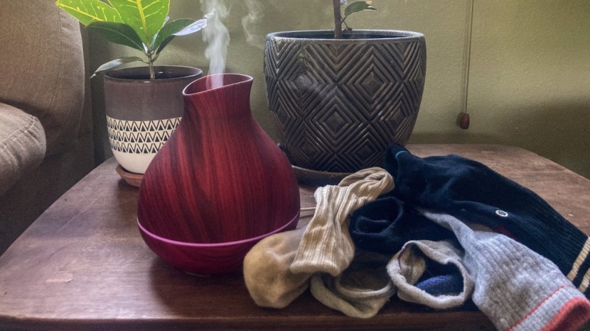 using a diffuser to test the breathability of each sock.