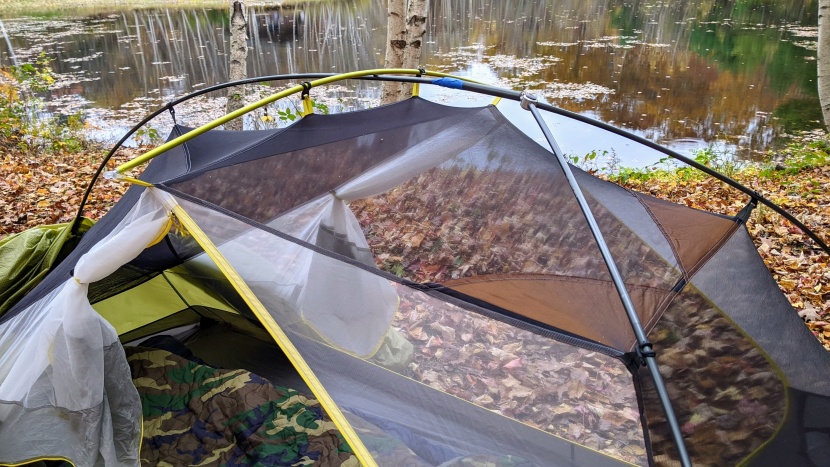 the semi-freestanding tent has a single pole that stretches to the...