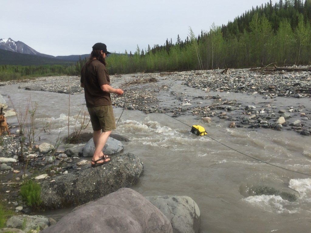 bike panniers - we tested each pannier's waterproofing in a fast-moving creek.