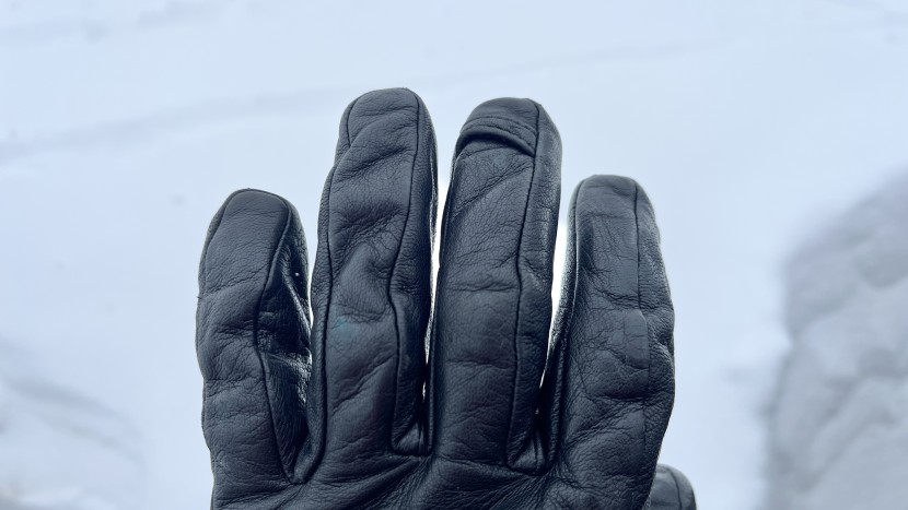 black diamond tour - a small carabiner clip on the back of the middle finger allows the...