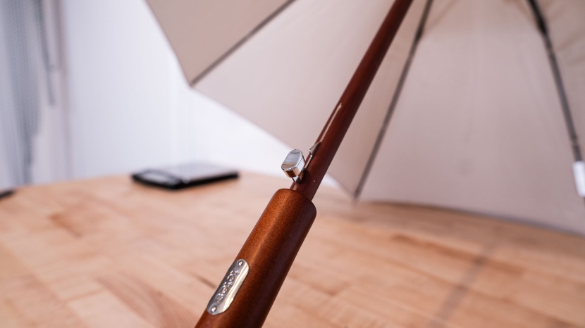 umbrella - the totes auto open wooden was easy and smooth to open and close.